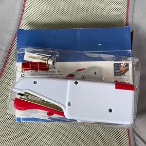 Handheld sewing machine